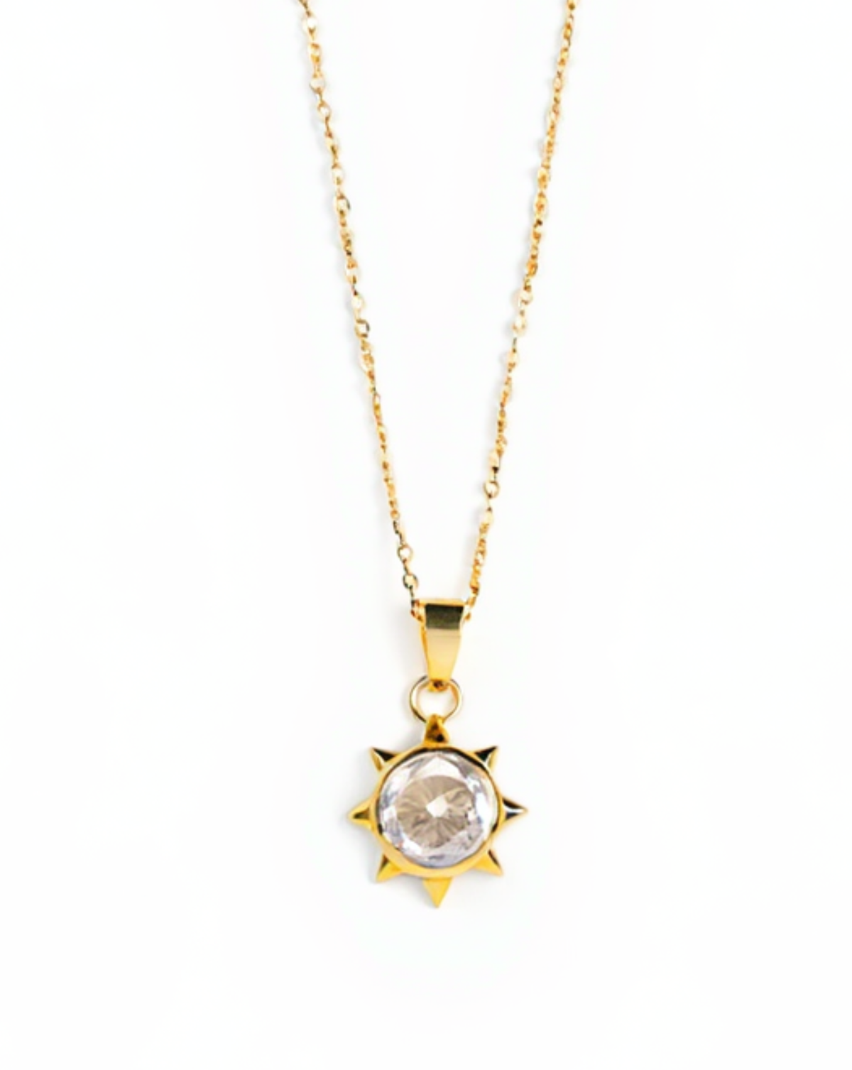 Gold necklace with a sun-shaped pendant on a white background